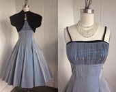 http://www.etsy.com/listing/118306943/1950-vintage-shimmery-blue-dress-with?ref=sr_gallery_11&ga_search_query=bolero&ga_view_type=gallery&ga_ship_to=ZZ&ga_page=6&ga_search_type=vintage